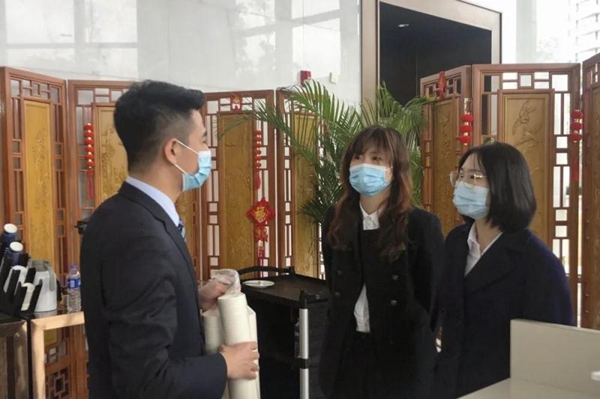 “来宾脸上的笑容是对我们工作最大的肯定”
